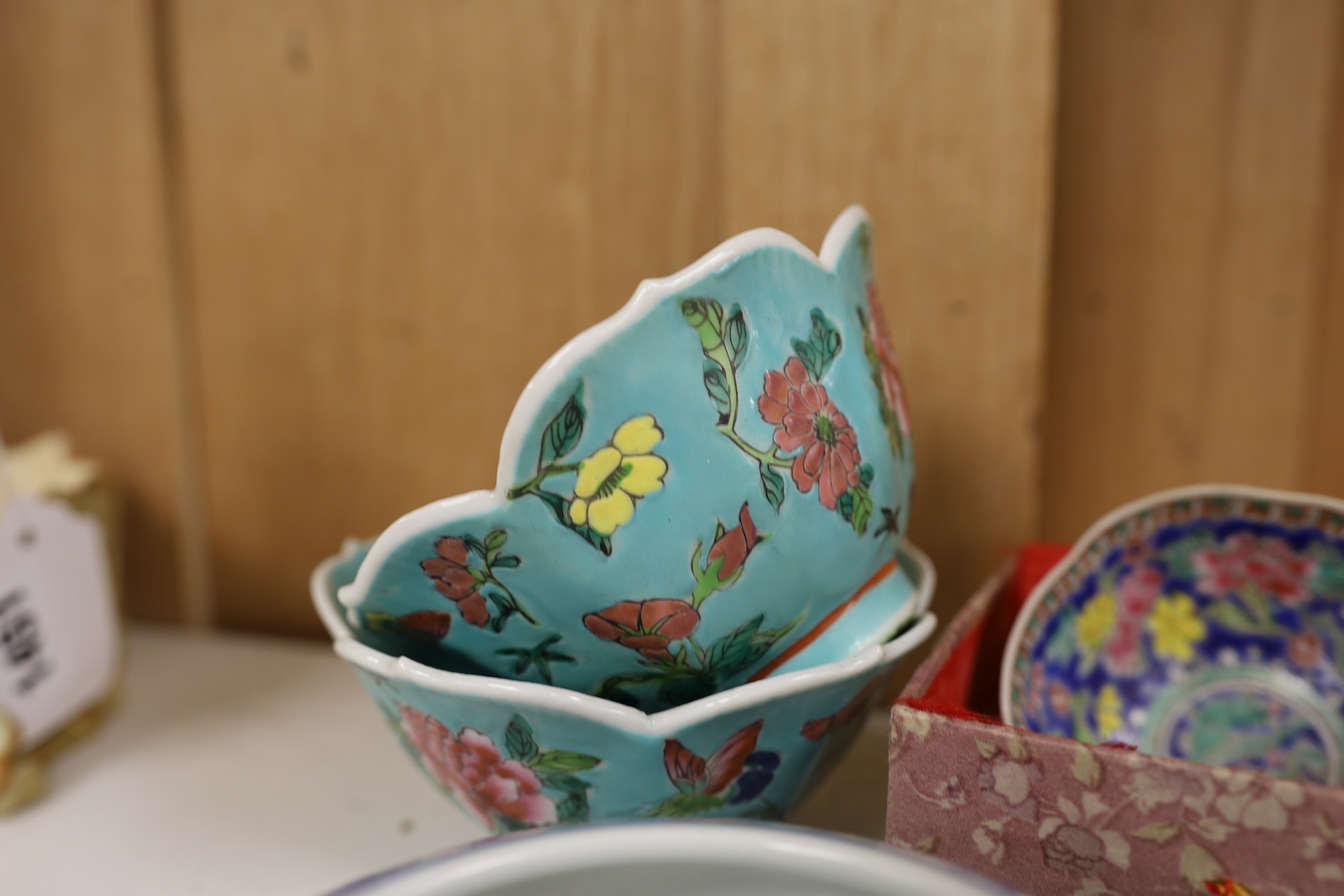 A pair of Chinese enamelled porcelain bowls, an eggshell bowl and a blue and white dragon bowl, turquoise bowls 11cm diameter (4). Condition - fair